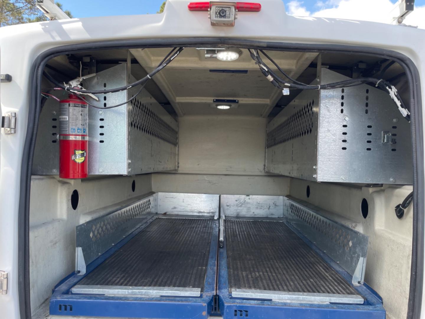 2015 WHITE CHEVROLET SILVERADO 2500H WORK TRUCK (1GC1KUEG7FF) with an 6.0L engine, Automatic transmission, located at 5103 Dorchester Rd., Charleston, SC, 29418-5607, (843) 767-1122, 36.245171, -115.228050 - Local Trade-in with Easy Clean Vinyl Interior, Backup Camera, AM/FM/AUX, Spacious Rear Seat, Power Windows, Power Locks, Power Mirrors, Utility Cab with Storage All Around, Pull Out Bed Storage, Ladder Rack, Safety Strobe Lights, Keyless Entry, Tow Package with Brake Assist, 4-Wheel Drive, Brush Gua - Photo#14